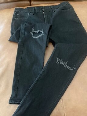 Levi's Black Skinny Jeans with Distressed Knees
